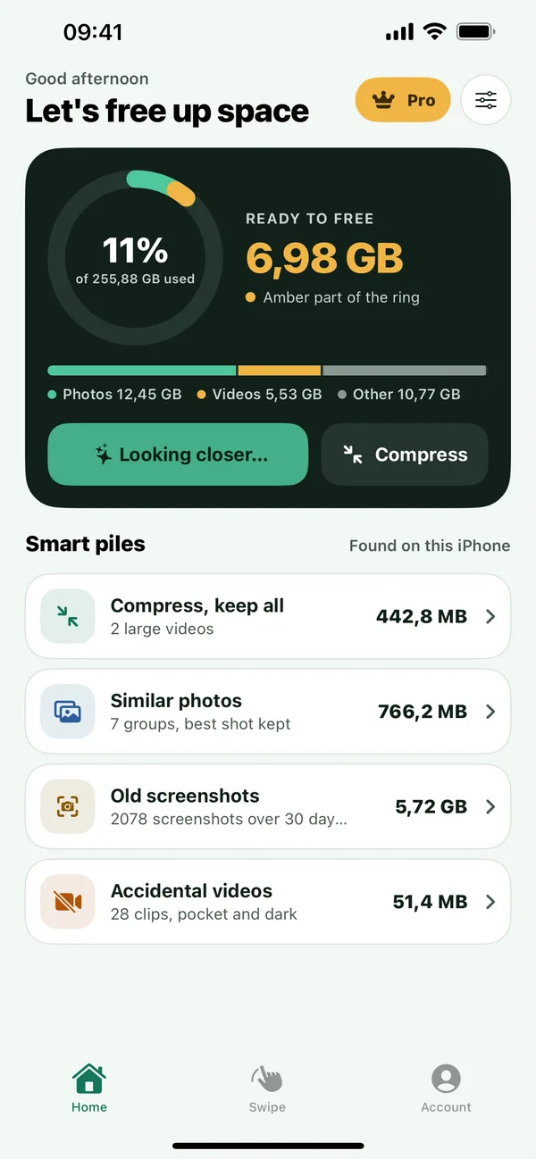 Tidyroll Home screen: a storage ring shows 11% of 255.88 GB used with 6.98 GB ready to free, above smart piles for large videos, similar photos, old screenshots and accidental videos